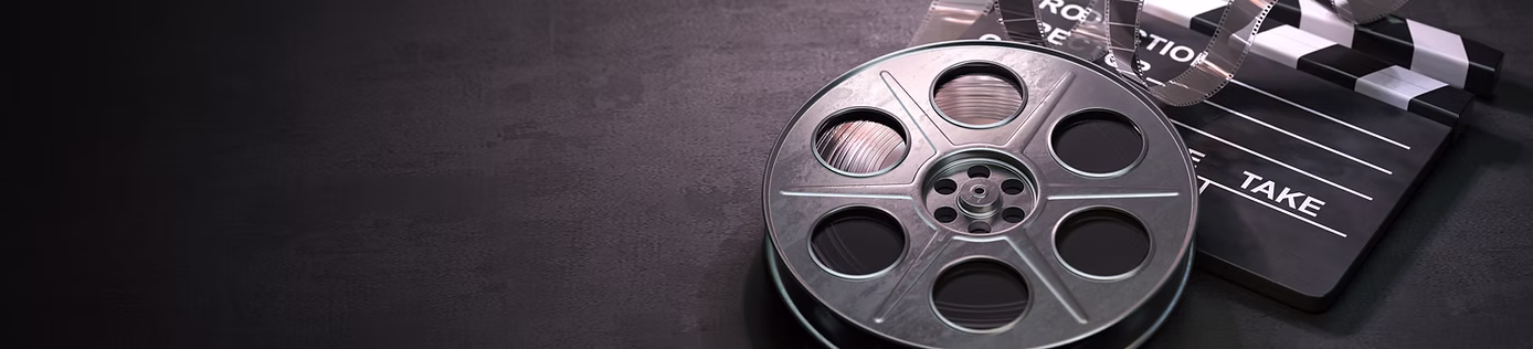 film-reel-and-clapper-board-2023-11-27-05-13-29-utc.jpg